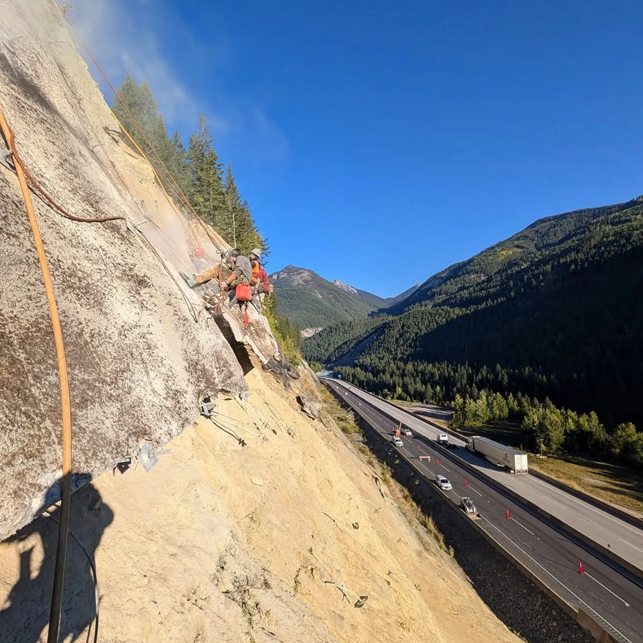 rope access workers performing rockfall work