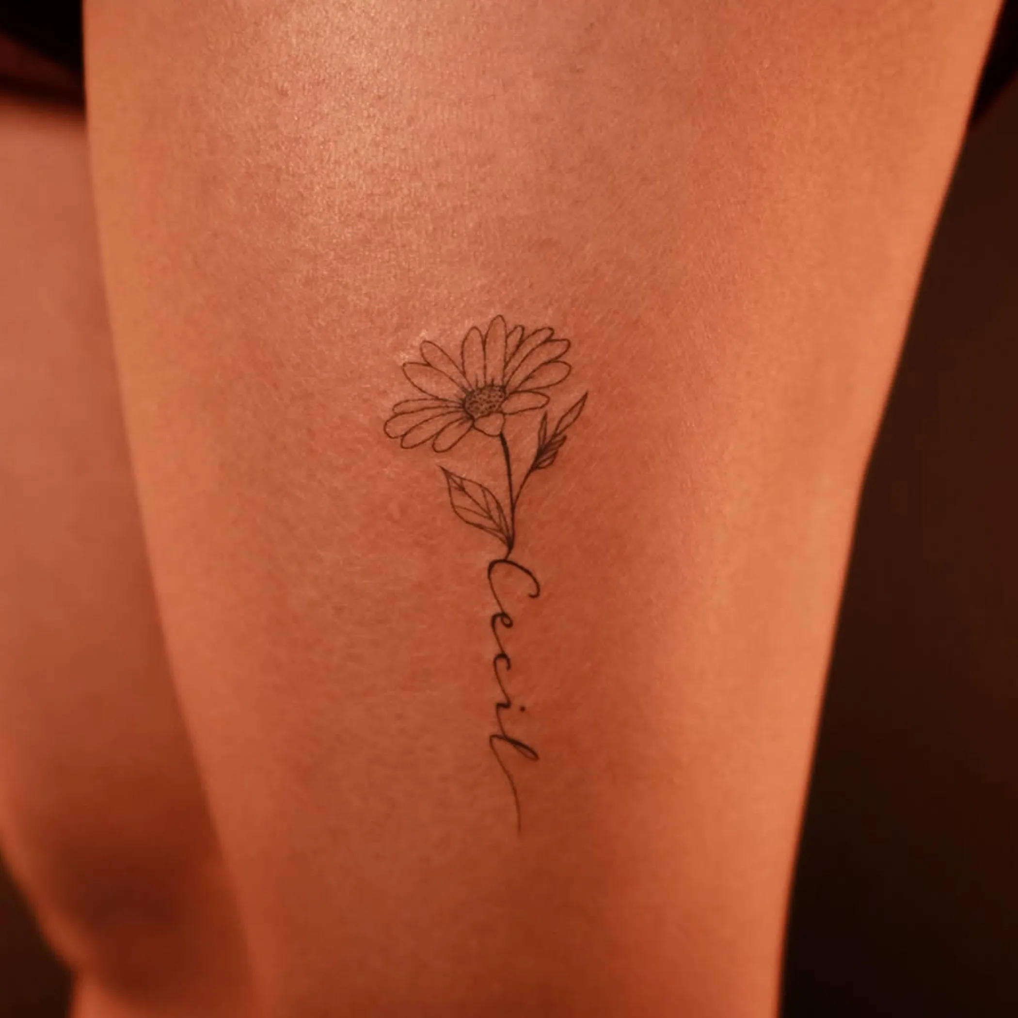 daisy flower tattoo