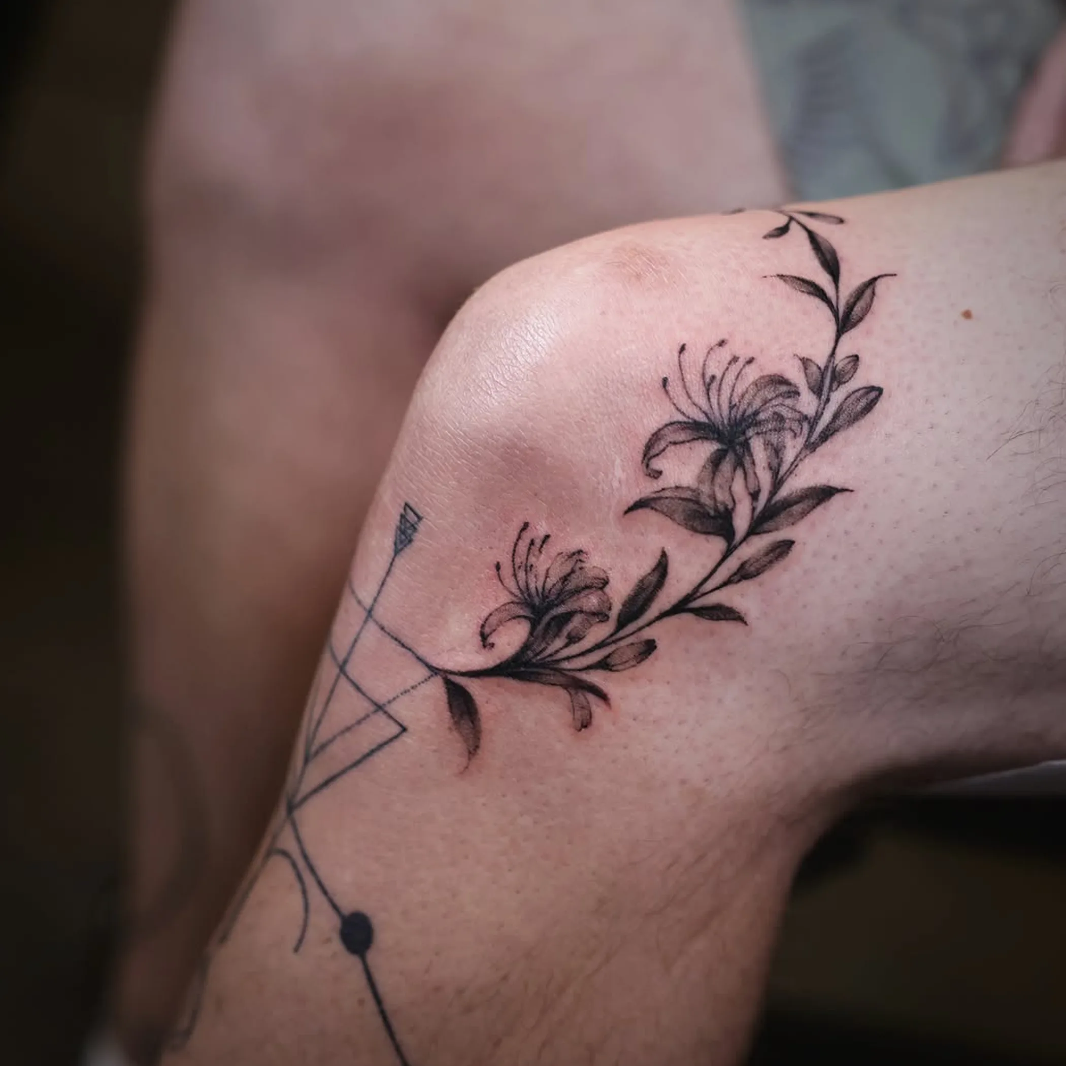 daisy and honeysuckle tattoo